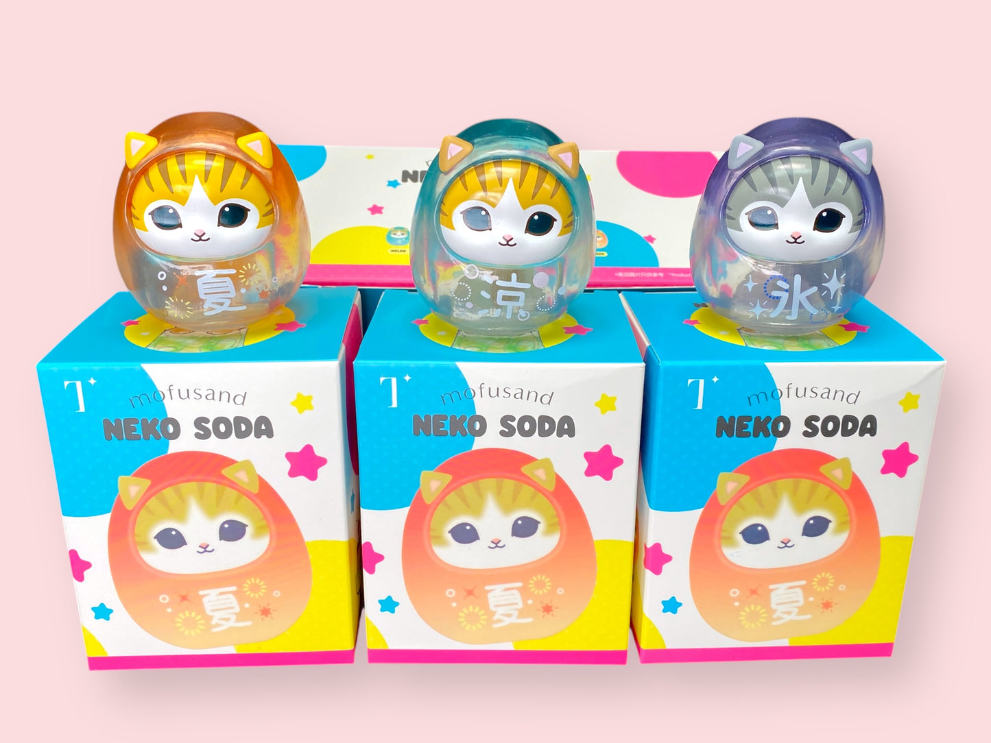 Mofusand Neko Soda Summer Daruma figure Option A, an orange transparent cat Daruma with a winking eye and the Japanese character for Summer.