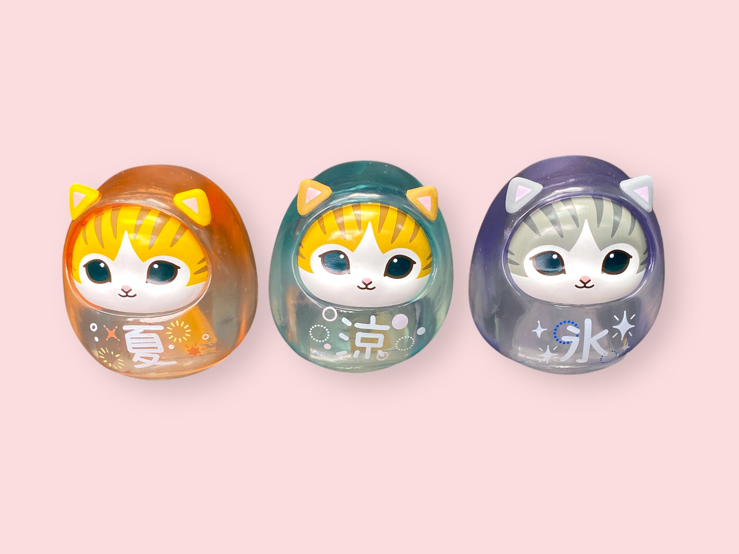 Mofusand Neko Soda Cool Daruma figure Option B, a teal transparent cat Daruma with both eyes open and the Japanese character for Cool.