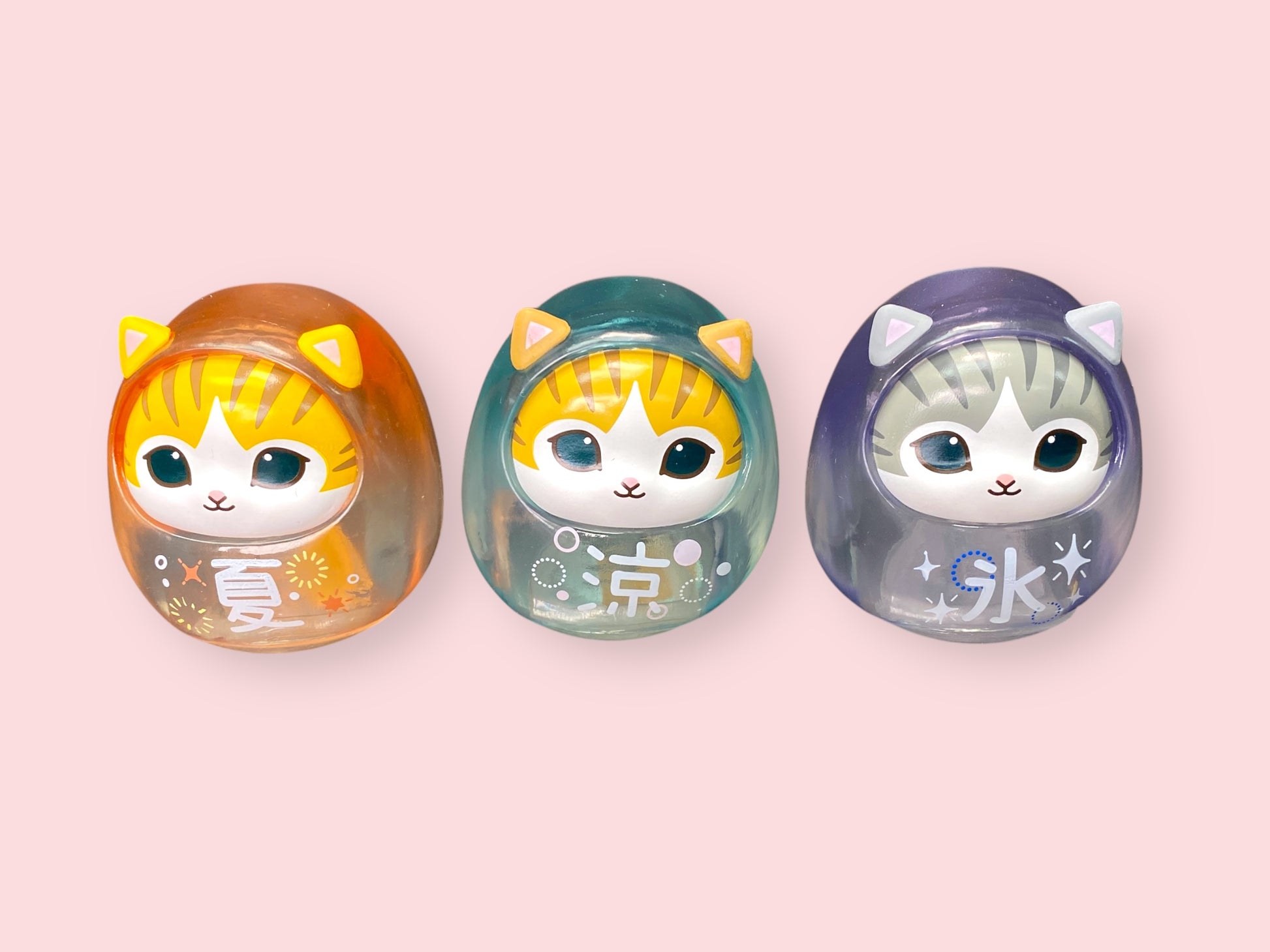 Mofusand Neko Soda Cool Daruma figure Option B, a teal transparent cat Daruma with both eyes open and the Japanese character for Cool.