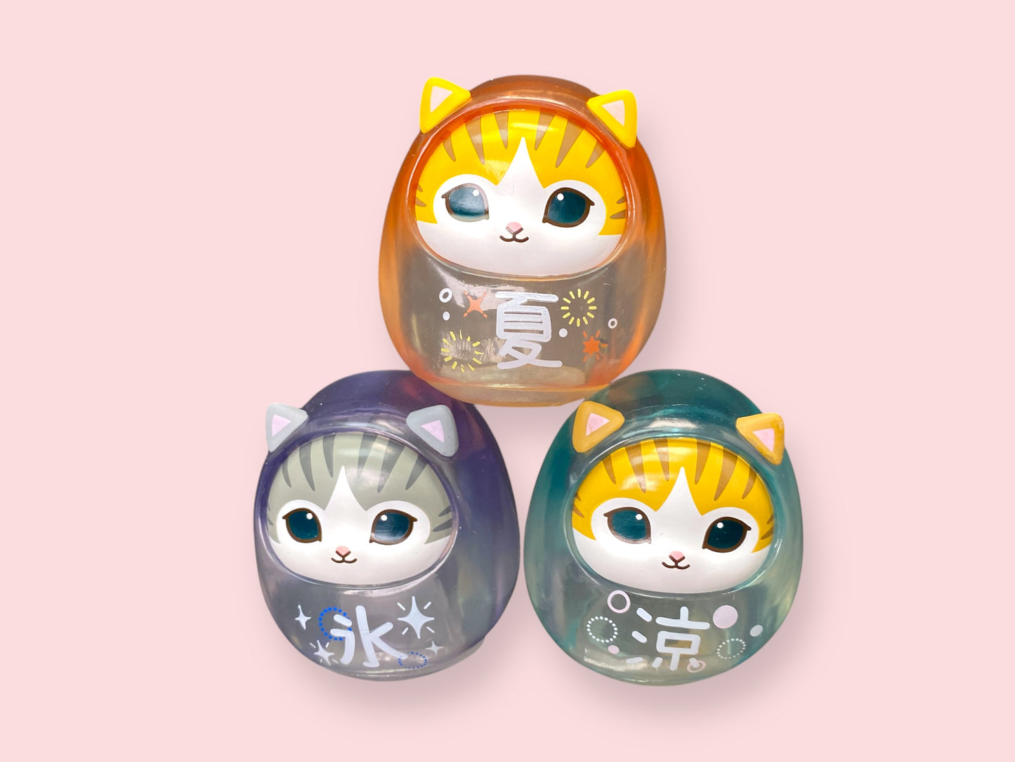 Mofusand Neko Soda Ice Daruma figure Option C, a purple transparent cat Daruma with a winking eye and the Japanese character for Ice.